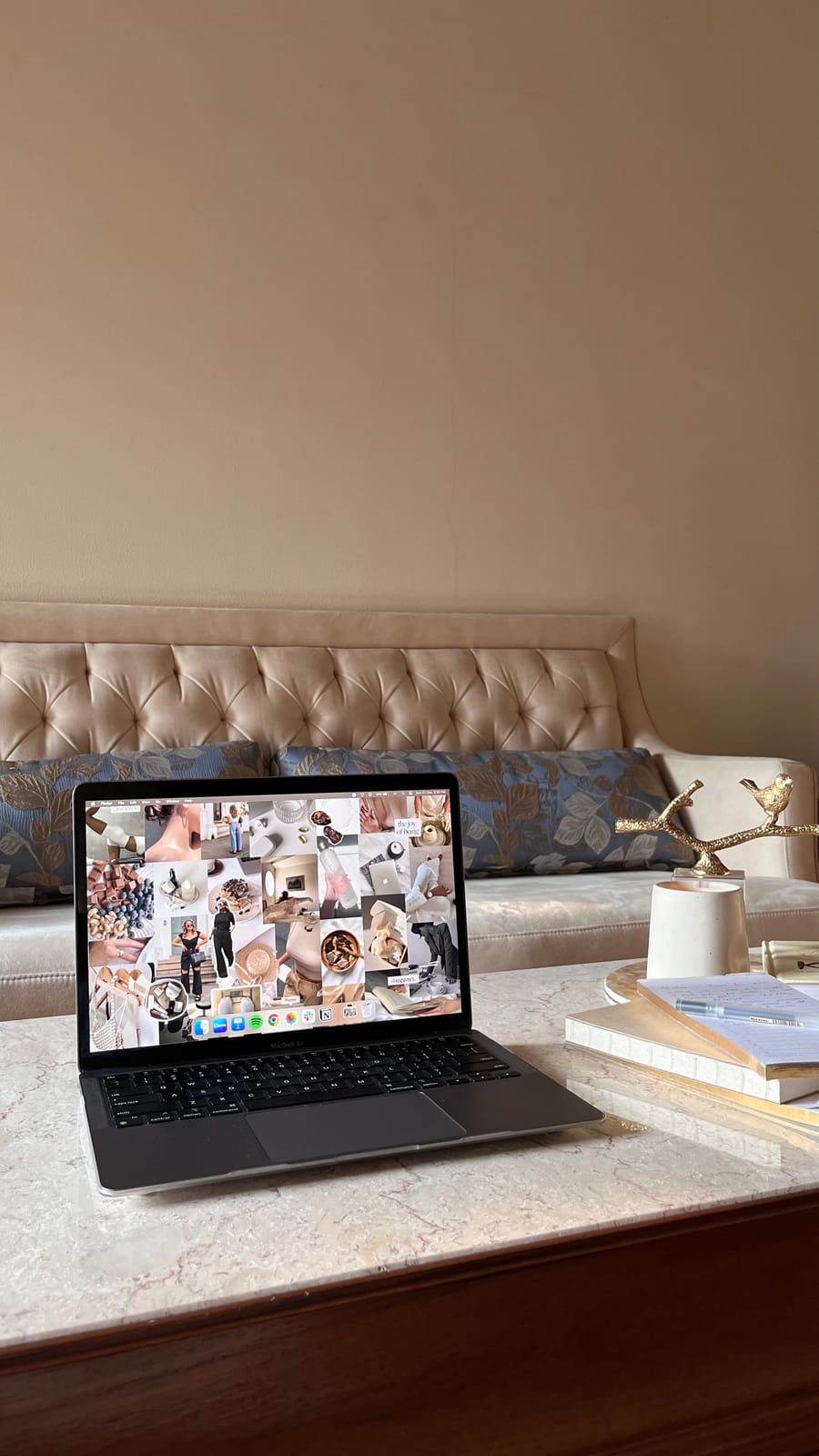 A digital mood board open on a laptop screen